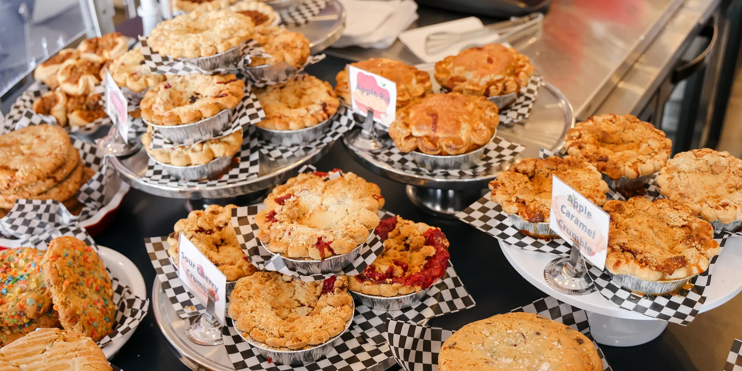 Pies on display at a pie shop.